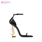Women's Black Rexine Heels with Gold YSL Heel